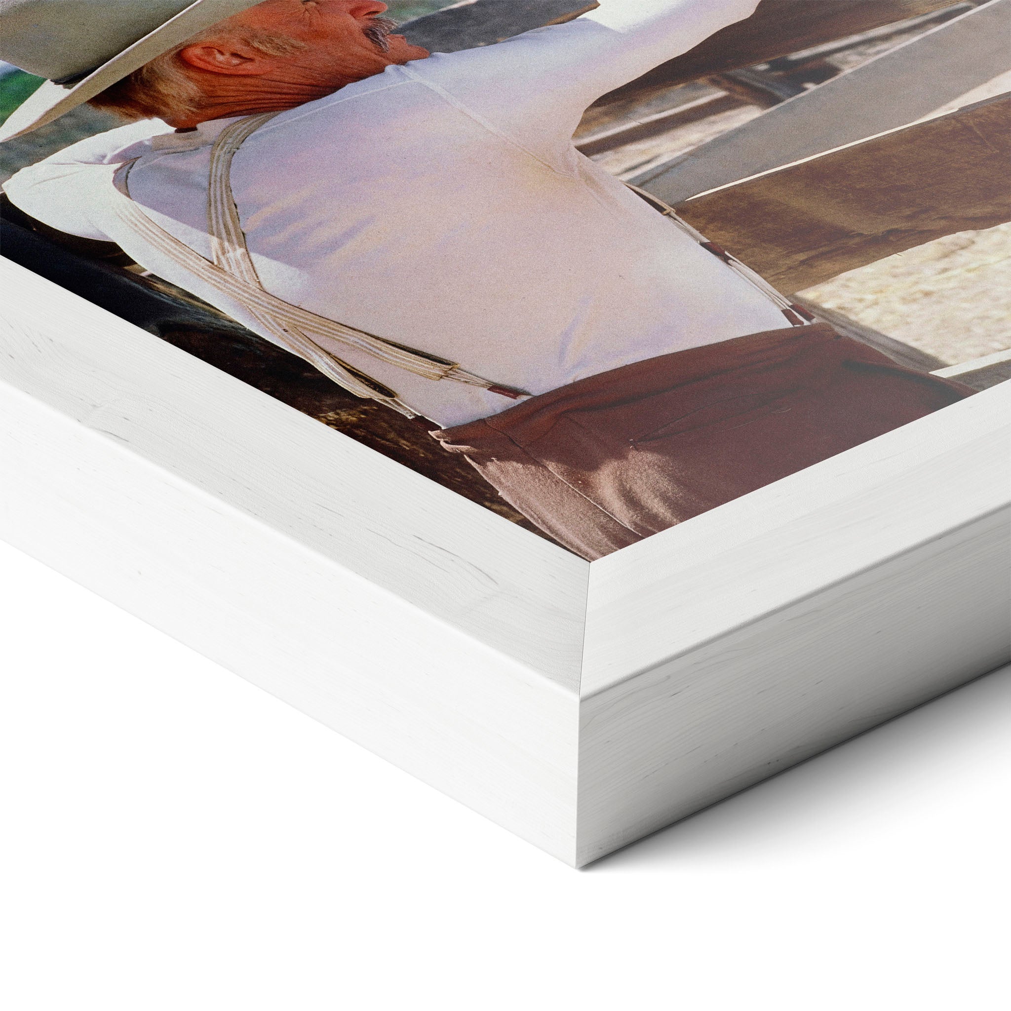 Corner close-up of the Lonesome Dove Hat Creek colour poster in a white frame