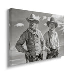Gallery-wrapped black and white canvas of Gus and Call on the Montana trail displayed on a wall