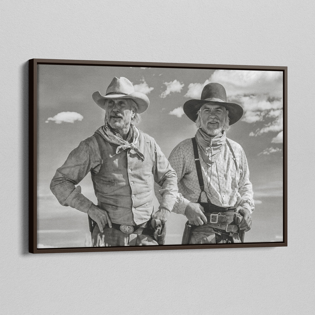Angled view of the Lonesome Dove Montana Trail black and white canvas in a dark walnut floating frame