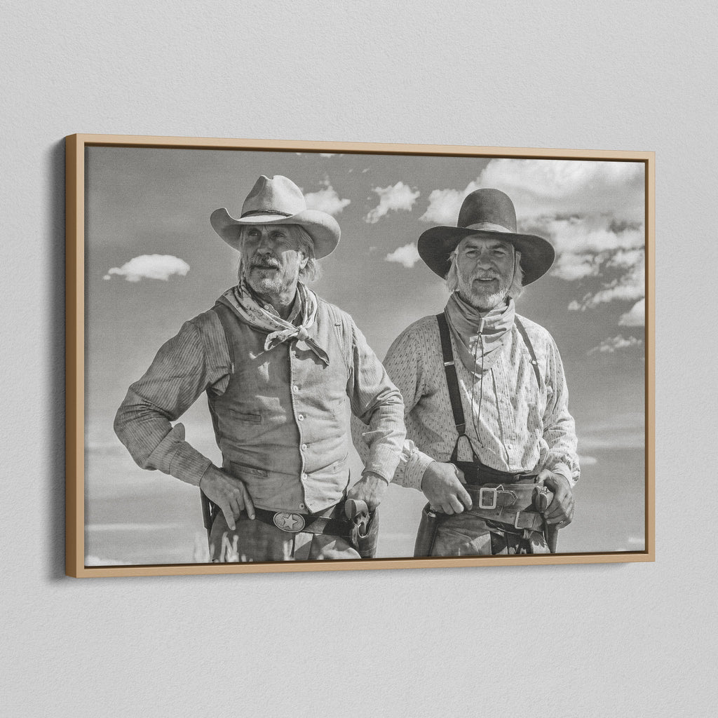 Angled view of the Lonesome Dove Montana Trail black and white canvas in a natural oak floating frame
