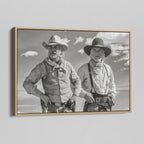 Angled view of the Lonesome Dove Montana Trail black and white canvas in a natural oak floating frame