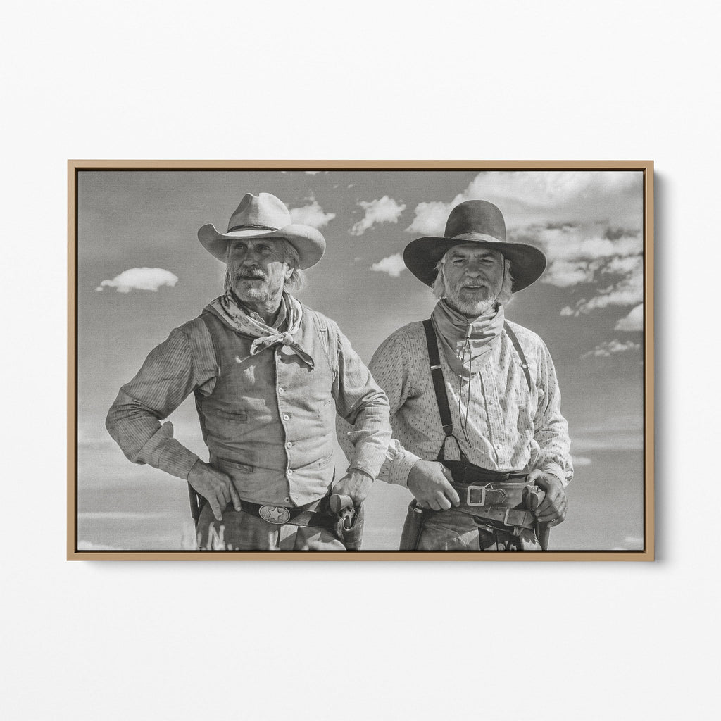 Front display of the Lonesome Dove Montana Trail black and white canvas in a natural oak floating frame