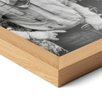 Close-up of the natural oak frame on the Lonesome Dove black and white poster