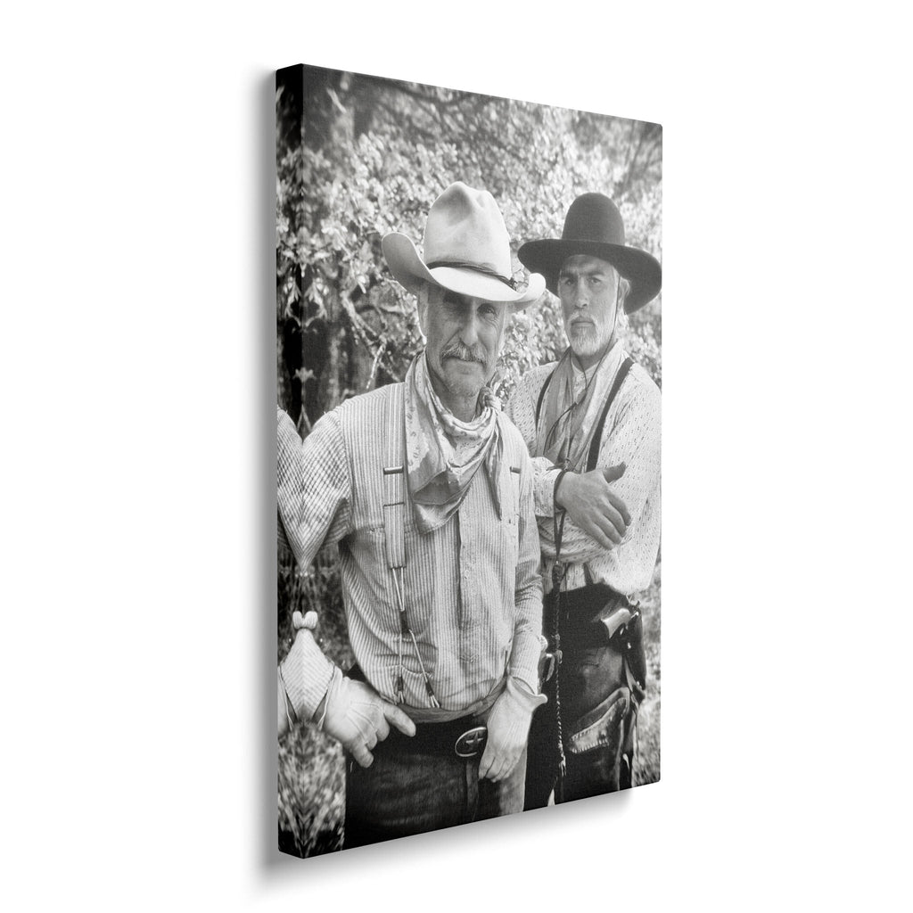 Gallery-wrapped black and white canvas of Gus and Call from Lonesome Dove displayed on a wall