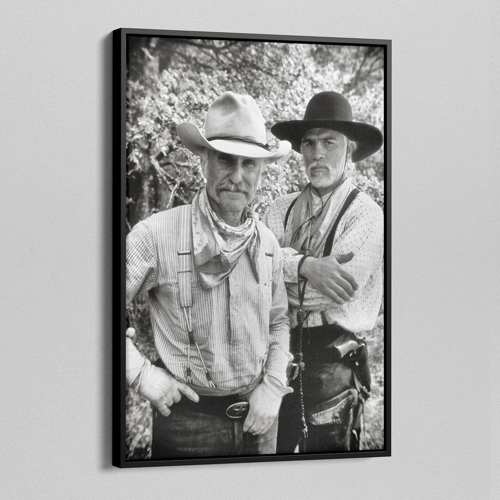 Angled view of the Lonesome Dove black and white canvas in a black floating frame