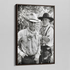 Angled view of the Lonesome Dove black and white canvas in a dark walnut floating frame