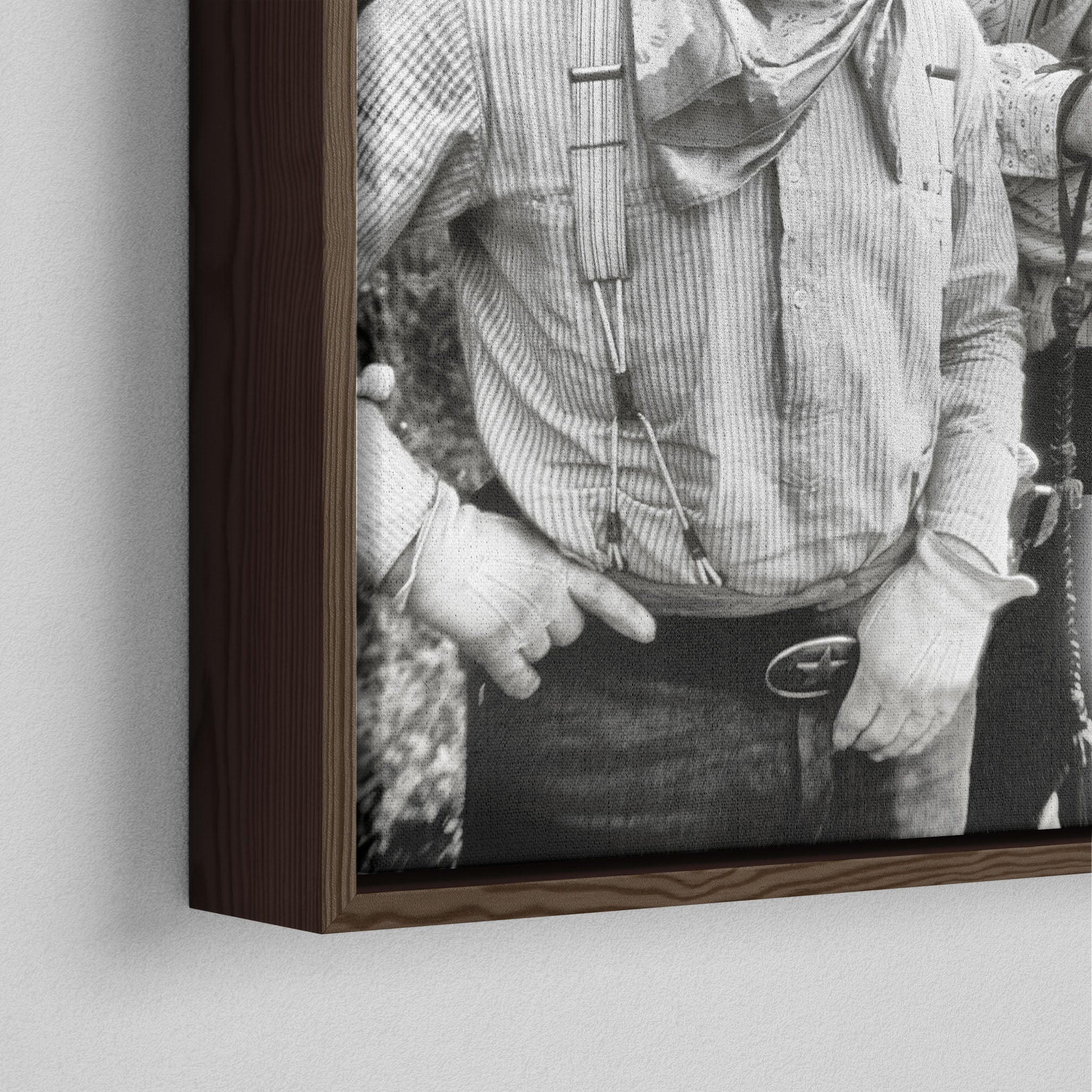 Close-up of the dark walnut floating frame on the Lonesome Dove black and white canvas