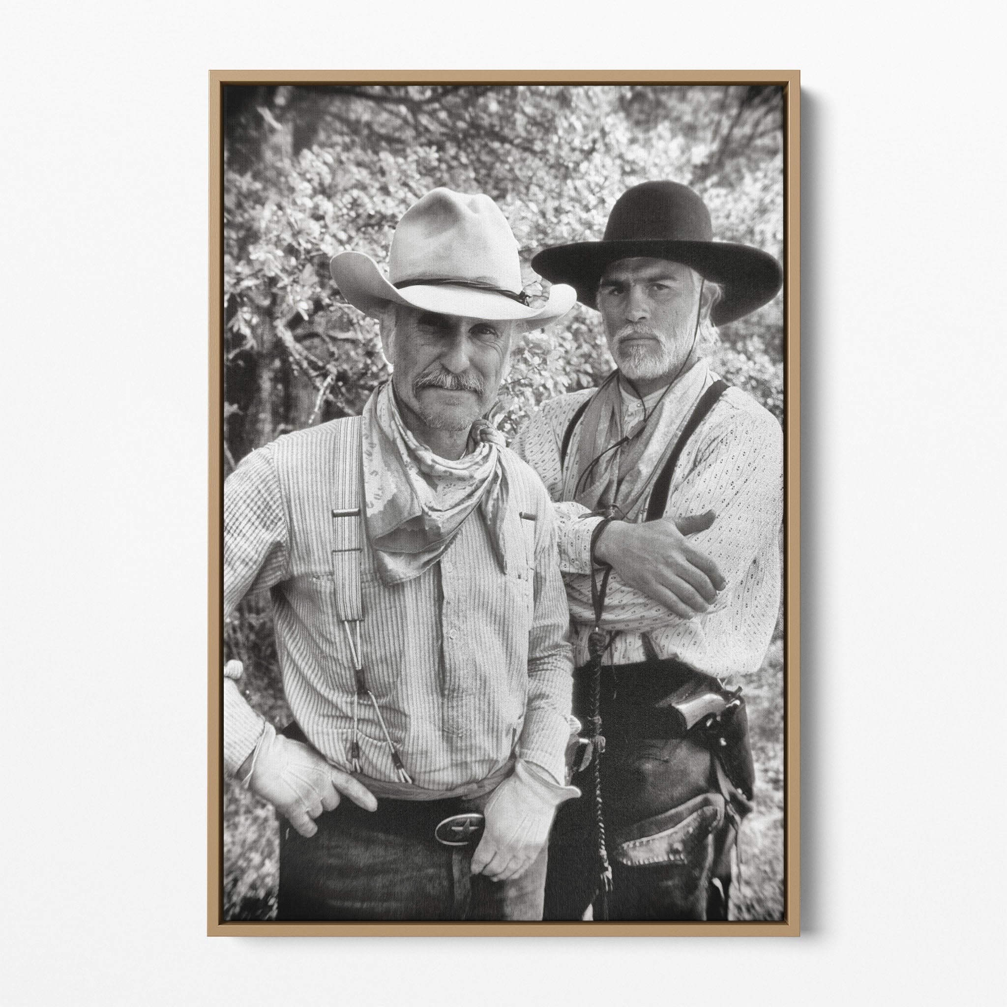 Front display of the Lonesome Dove black and white canvas in a natural oak floating frame