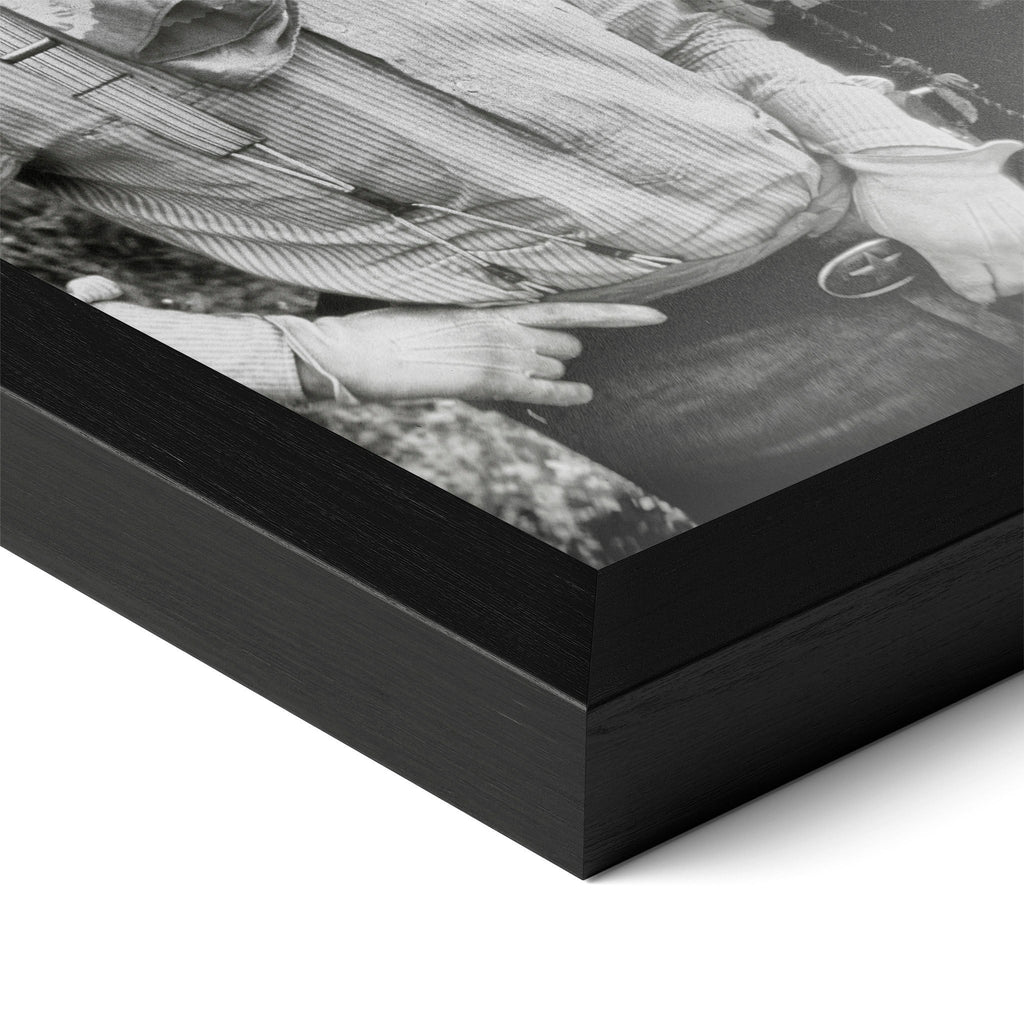 Close-up of the Lonesome Dove black and white poster in a classic black wood frame