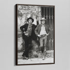 Angled view of the Butch Cassidy and the Sundance Kid black and white canvas in a dark walnut floating frame