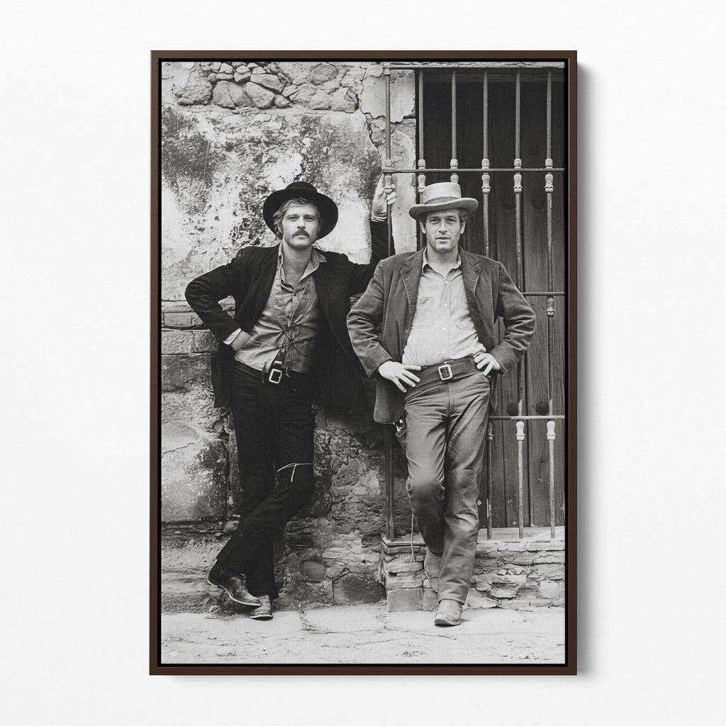 Front display of the Butch Cassidy and the Sundance Kid black and white canvas in a dark walnut floating frame