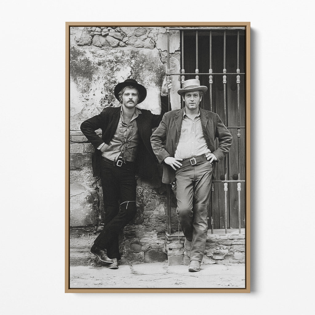 Front display of the Butch Cassidy and the Sundance Kid black and white canvas in a natural oak floating frame