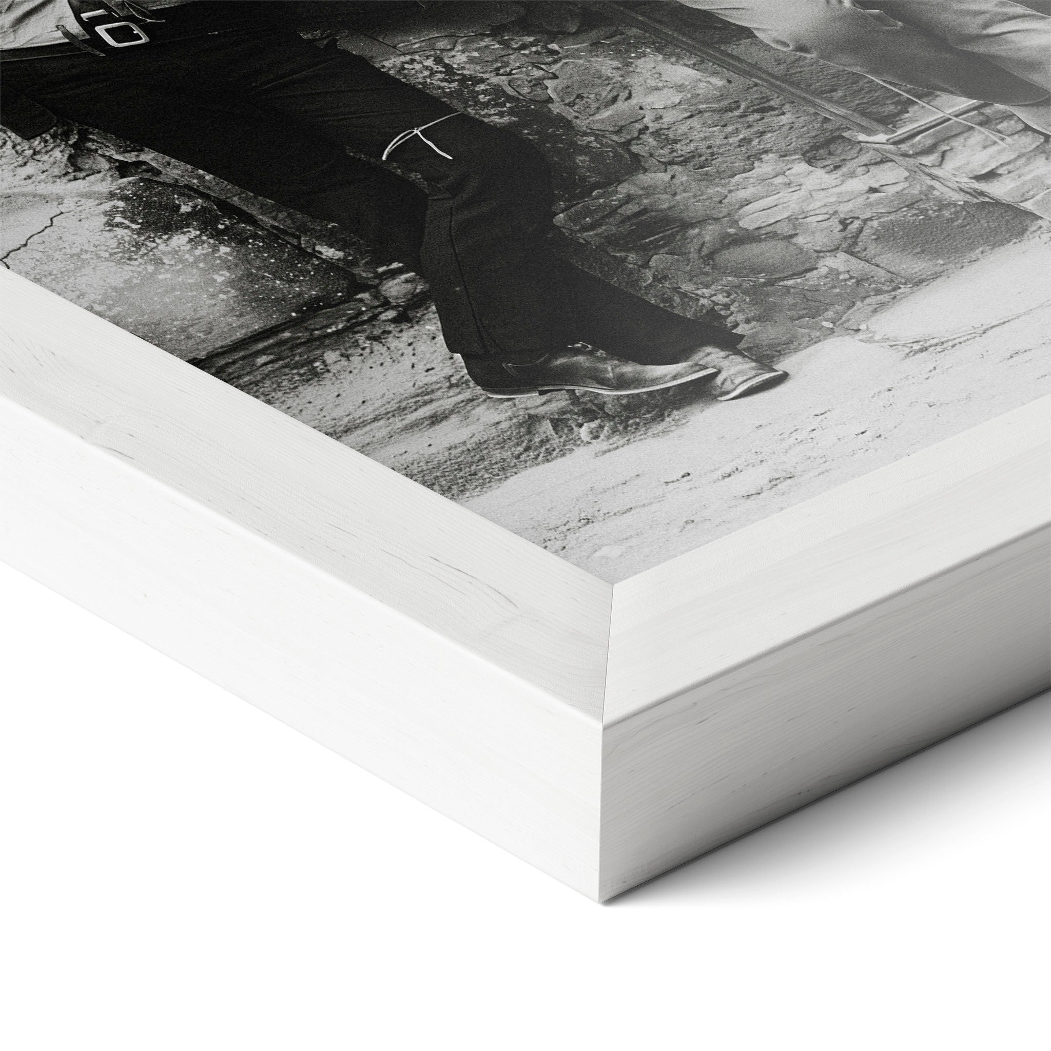 Corner close-up of the Butch Cassidy and the Sundance Kid black and white poster in a white frame
