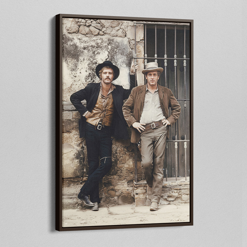 Angled view of the Butch Cassidy and the Sundance Kid colour canvas in a dark walnut floating frame