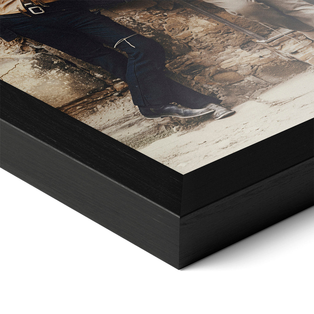 Close-up of the Butch Cassidy and the Sundance Kid colour poster in a classic black wood frame