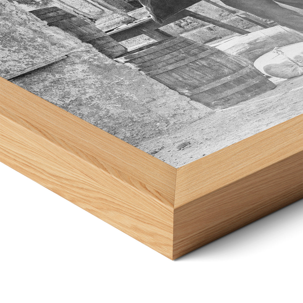 Close-up of the natural oak frame on the Butch Cassidy and the Sundance Kid final shootout black and white poster