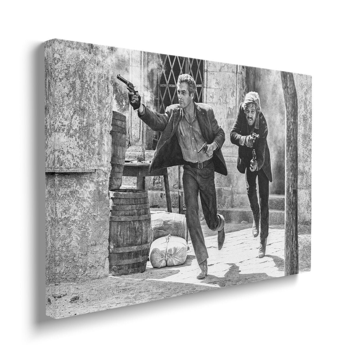 Gallery-wrapped black and white canvas of the Butch Cassidy and the Sundance Kid final shootout displayed on a wall