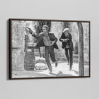Angled view of the Butch Cassidy and the Sundance Kid final shootout black and white canvas in a dark walnut floating frame