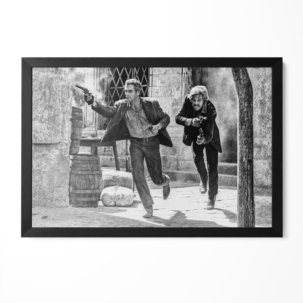 Paul Newman and Robert Redford as Butch Cassidy and the Sundance Kid in the final shootout, black and white print in a classic black poster frame
