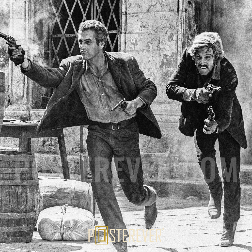 Zoomed detail of Paul Newman and Robert Redford charging out with revolvers in Butch Cassidy and the Sundance Kid, in black and white