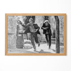 Butch Cassidy and the Sundance Kid final shootout black and white print in a natural oak poster frame