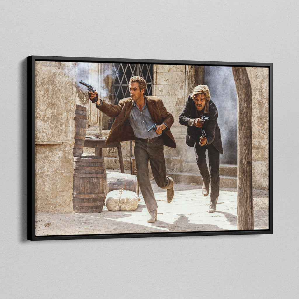 Angled view of the Butch Cassidy and the Sundance Kid final shootout color canvas in a black floating frame