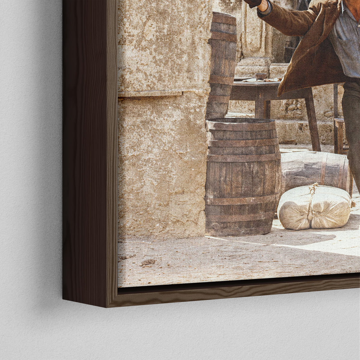Close-up of the dark walnut floating frame on the Butch Cassidy and the Sundance Kid final shootout color canvas