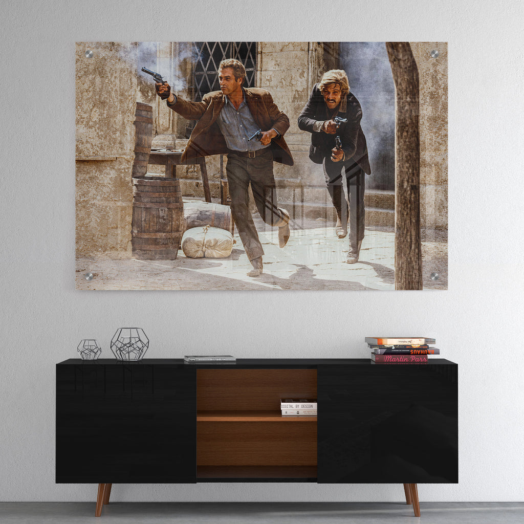 High-gloss acrylic color print of the Butch Cassidy and the Sundance Kid final shootout displayed on a wall