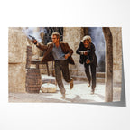 Unframed color print of Butch Cassidy and the Sundance Kid running out with revolvers drawn in the final shootout