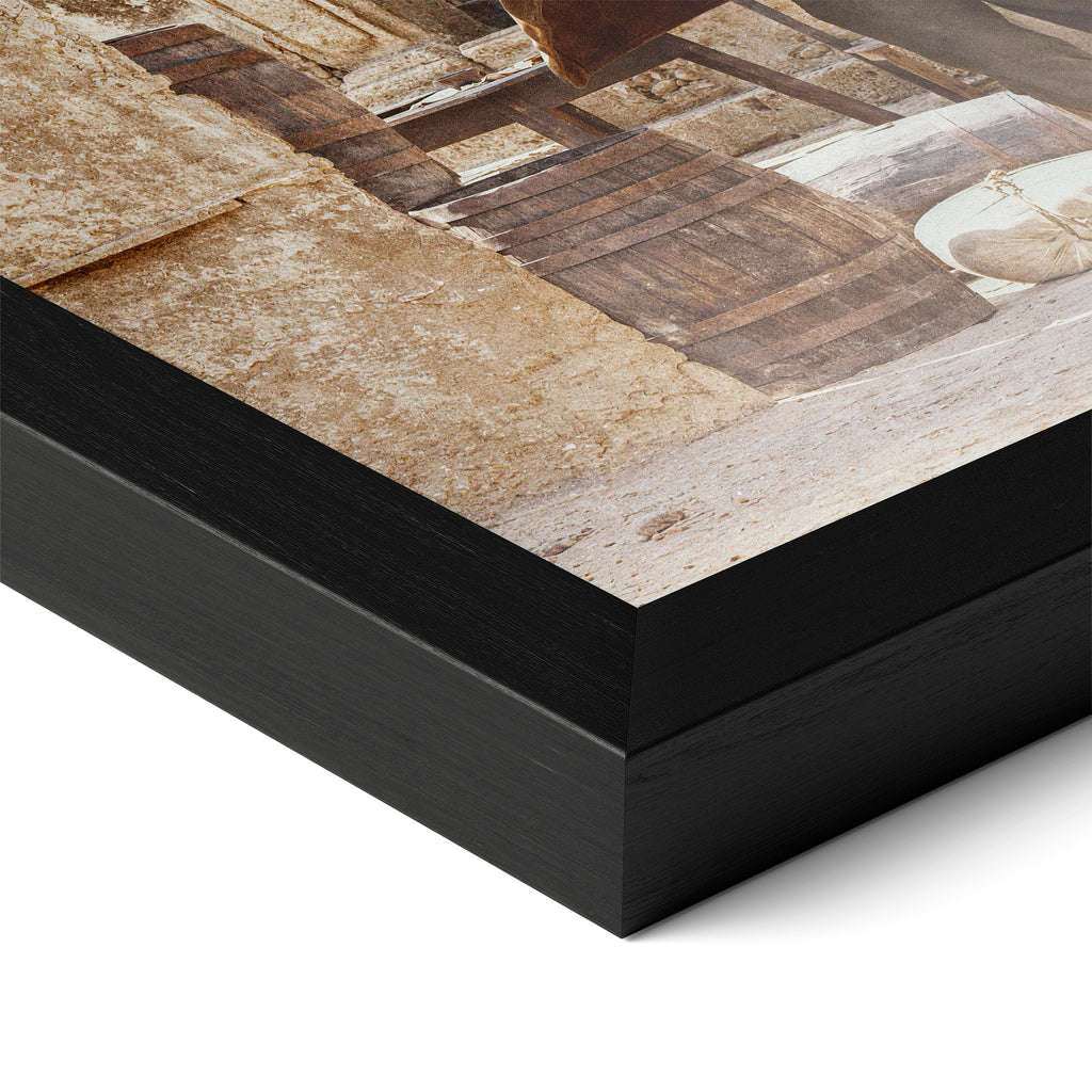 Close-up of the Butch Cassidy and the Sundance Kid final shootout color poster in a classic black wood frame