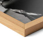 Corner close-up of the Stevie Nicks black and white portrait in a natural oak frame