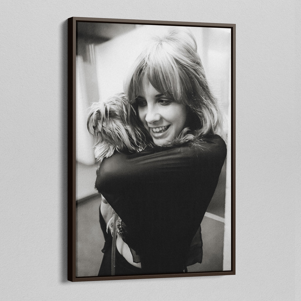 Angled view of the Stevie Nicks black and white portrait canvas in a dark walnut floating frame