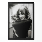 Stevie Nicks black and white candid portrait cuddling her dog in a classic black poster frame