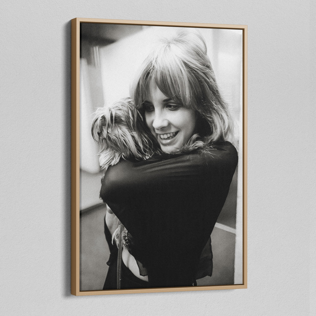 Angled view of the Stevie Nicks black and white portrait canvas in a natural oak floating frame