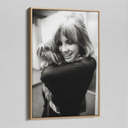 Angled view of the Stevie Nicks black and white portrait canvas in a natural oak floating frame