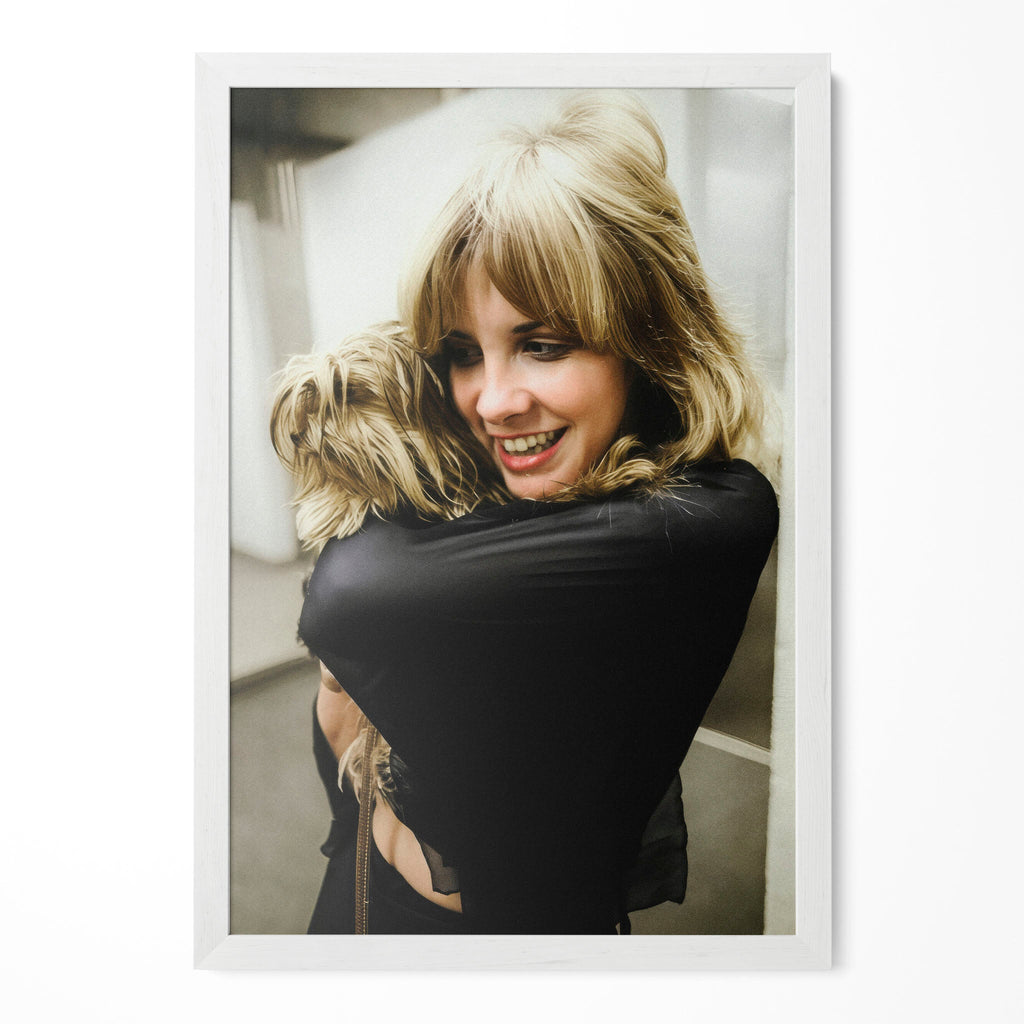 Stevie Nicks candid colour portrait with her dog in a classic white poster frame