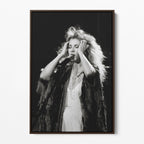 Front view of the Stevie Nicks 1970s live black and white canvas in a dark walnut floating frame