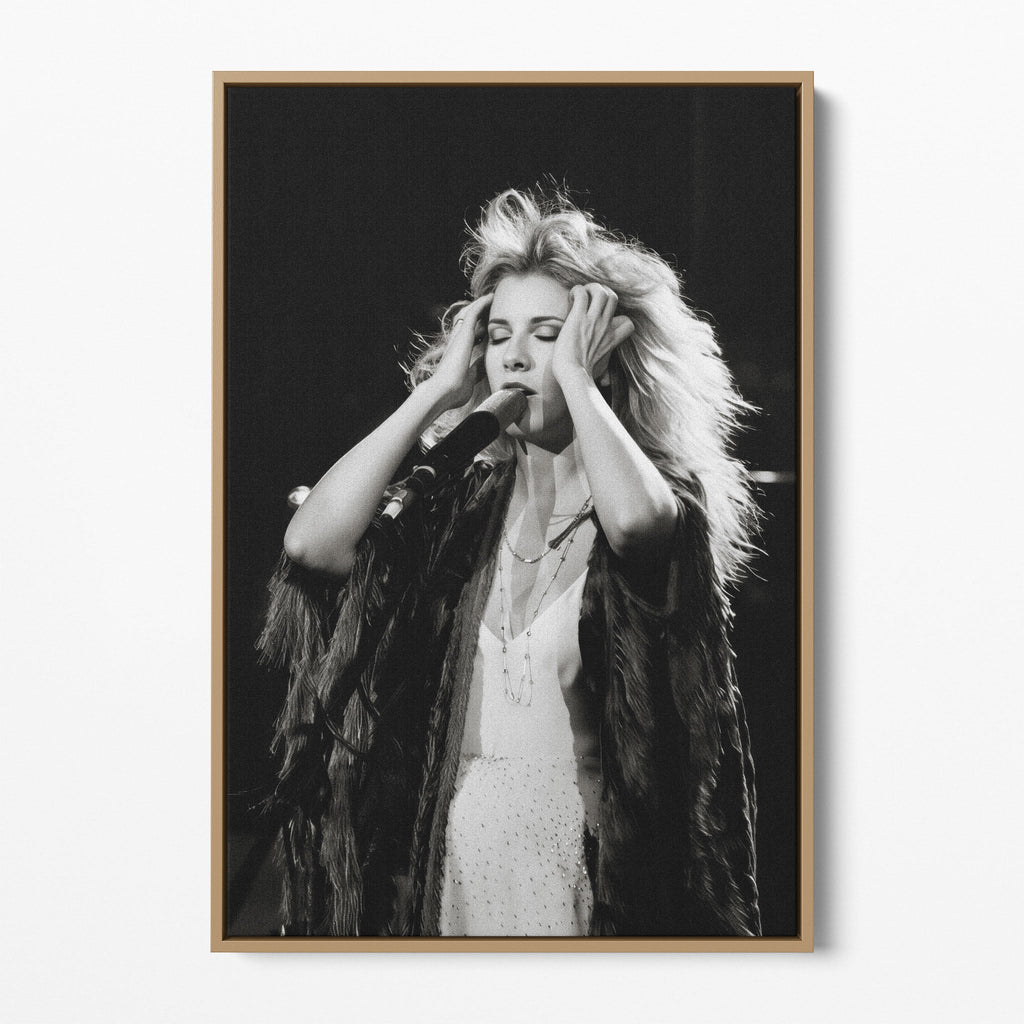 Front view of the Stevie Nicks 1970s live black and white canvas in a natural oak floating frame