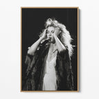 Front view of the Stevie Nicks 1970s live black and white canvas in a natural oak floating frame