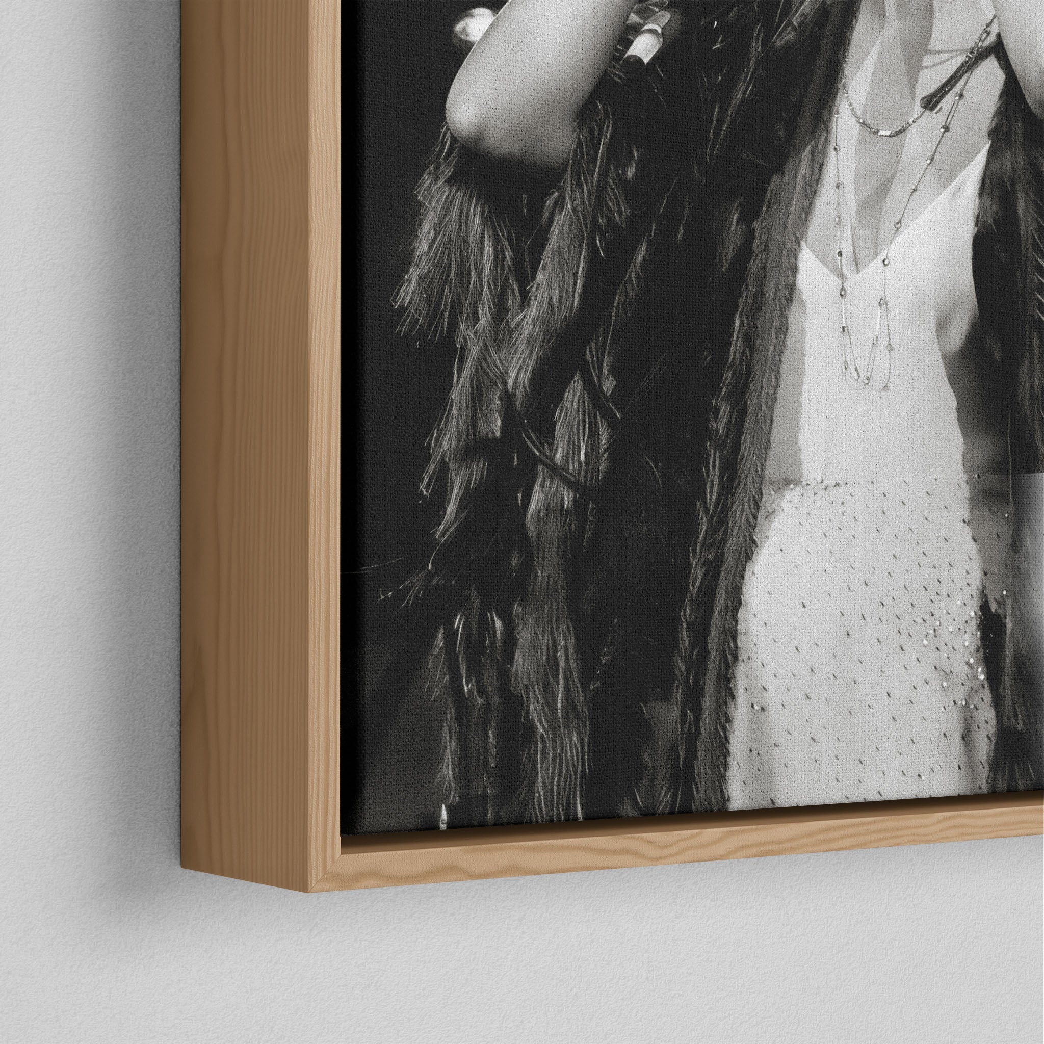 Corner close-up of the natural oak floating frame on the Stevie Nicks 1970s live black and white canvas