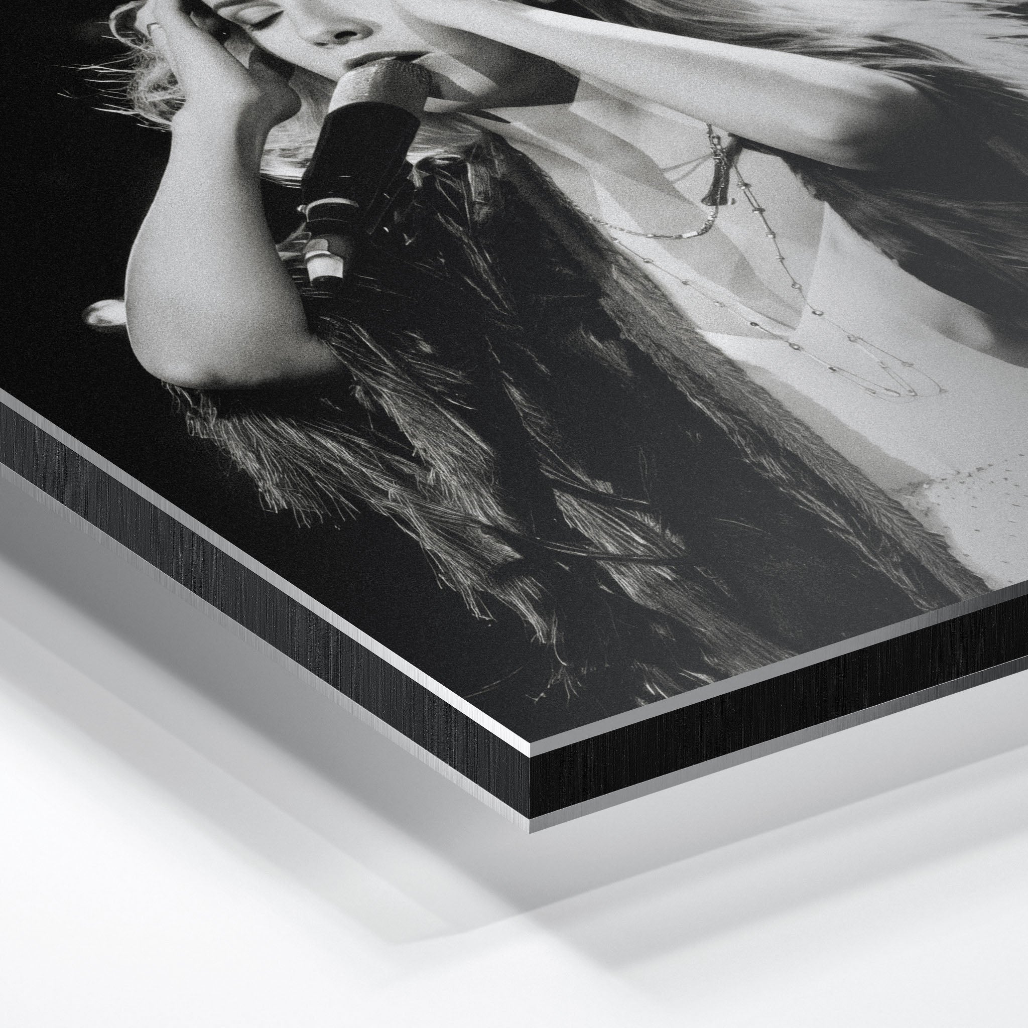 Close-up of the aluminium edge on the Stevie Nicks 1970s live black and white metal print
