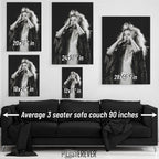 Wall art size comparison chart displaying multiple print dimensions above an average 3-seater sofa