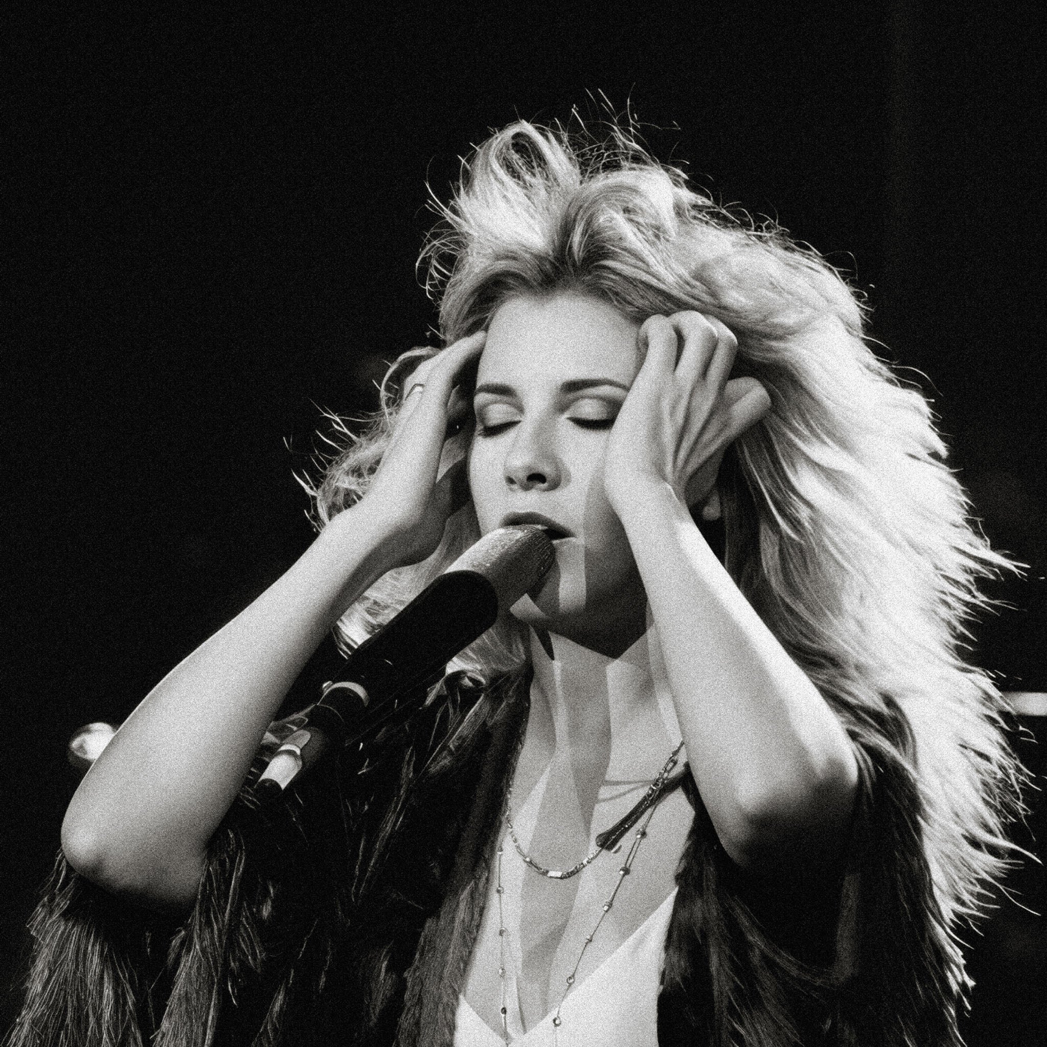 Medium zoom highlighting the crisp detail and deep contrast of the Stevie Nicks 1970s live black and white print