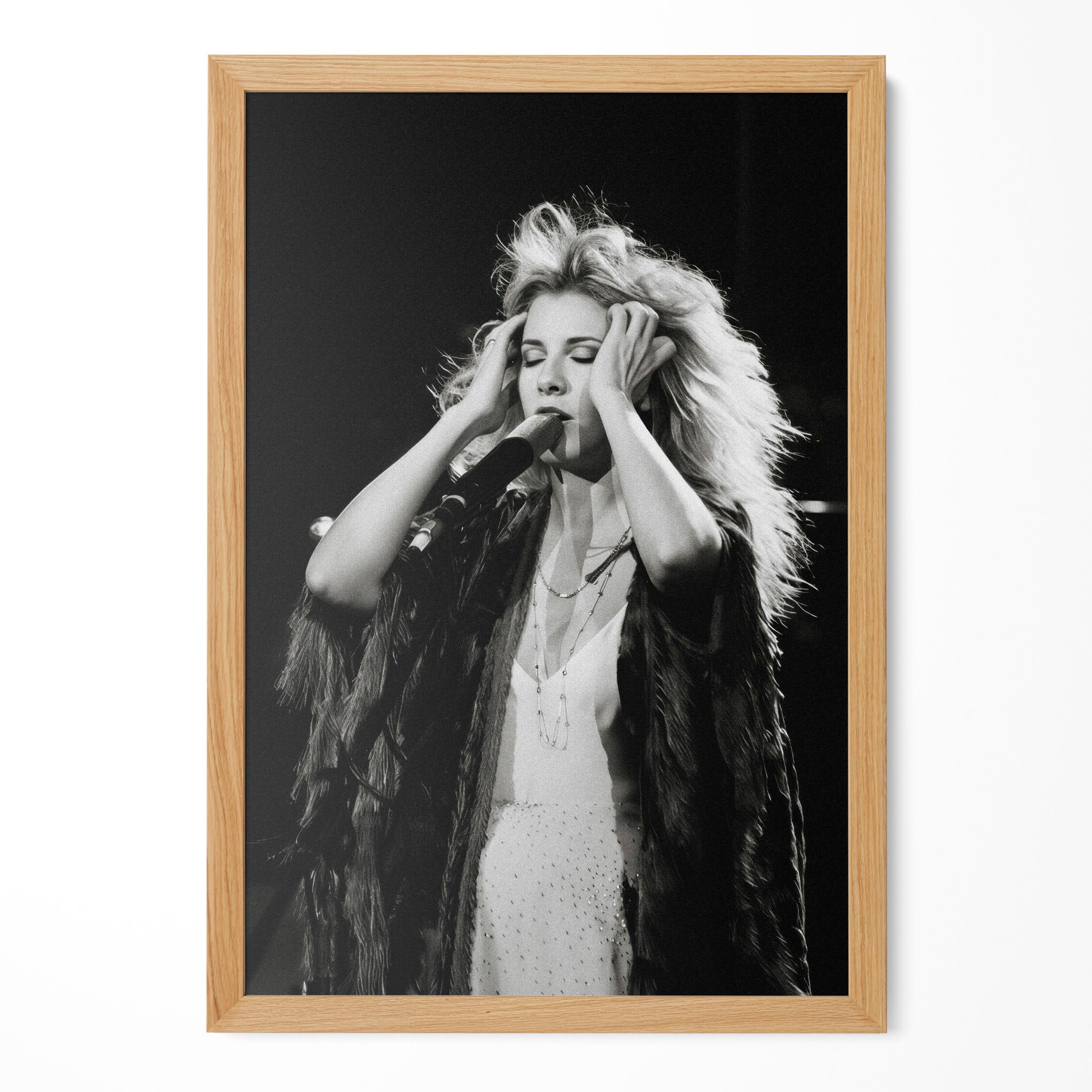 Stevie Nicks late 1970s live concert black and white art print in a natural oak poster frame