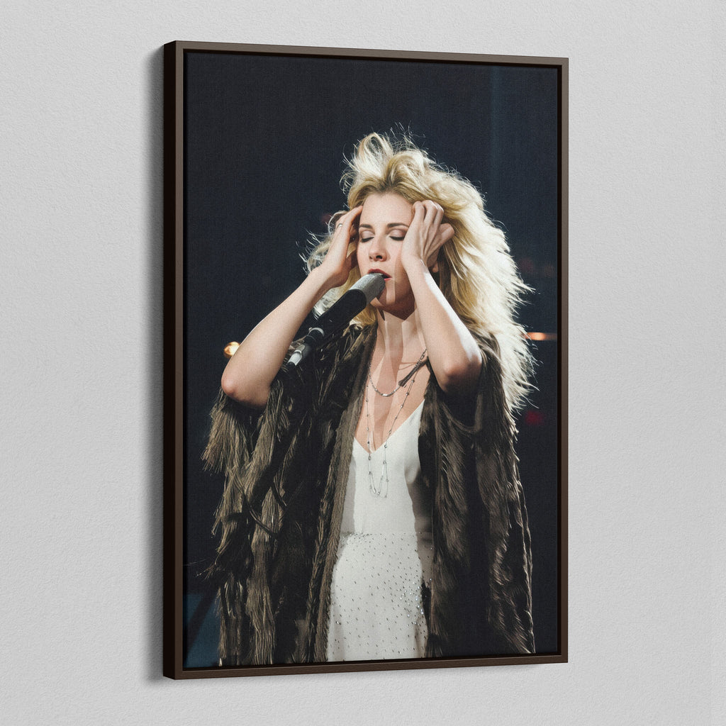 Angled view of the Stevie Nicks 1970s live colour canvas in a dark walnut floating frame