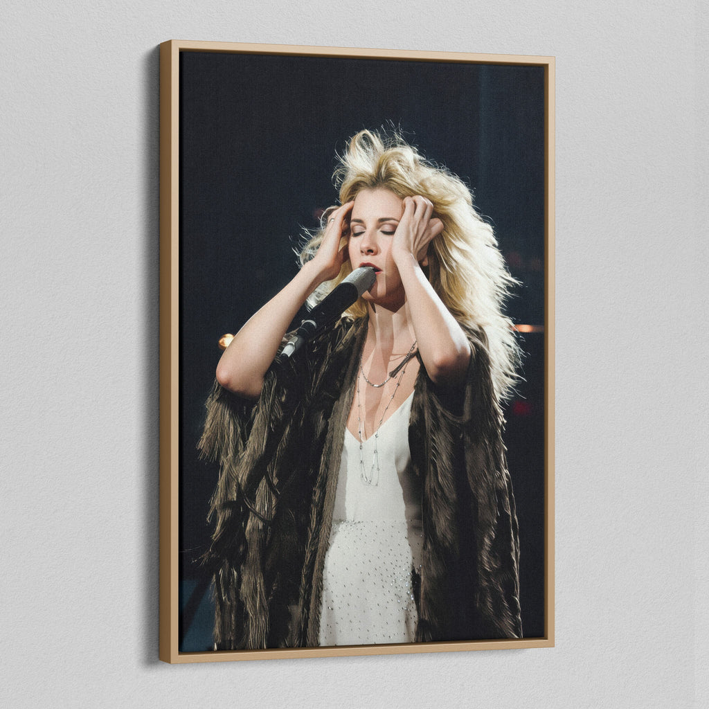 Angled view of the Stevie Nicks 1970s live colour canvas in a natural oak floating frame