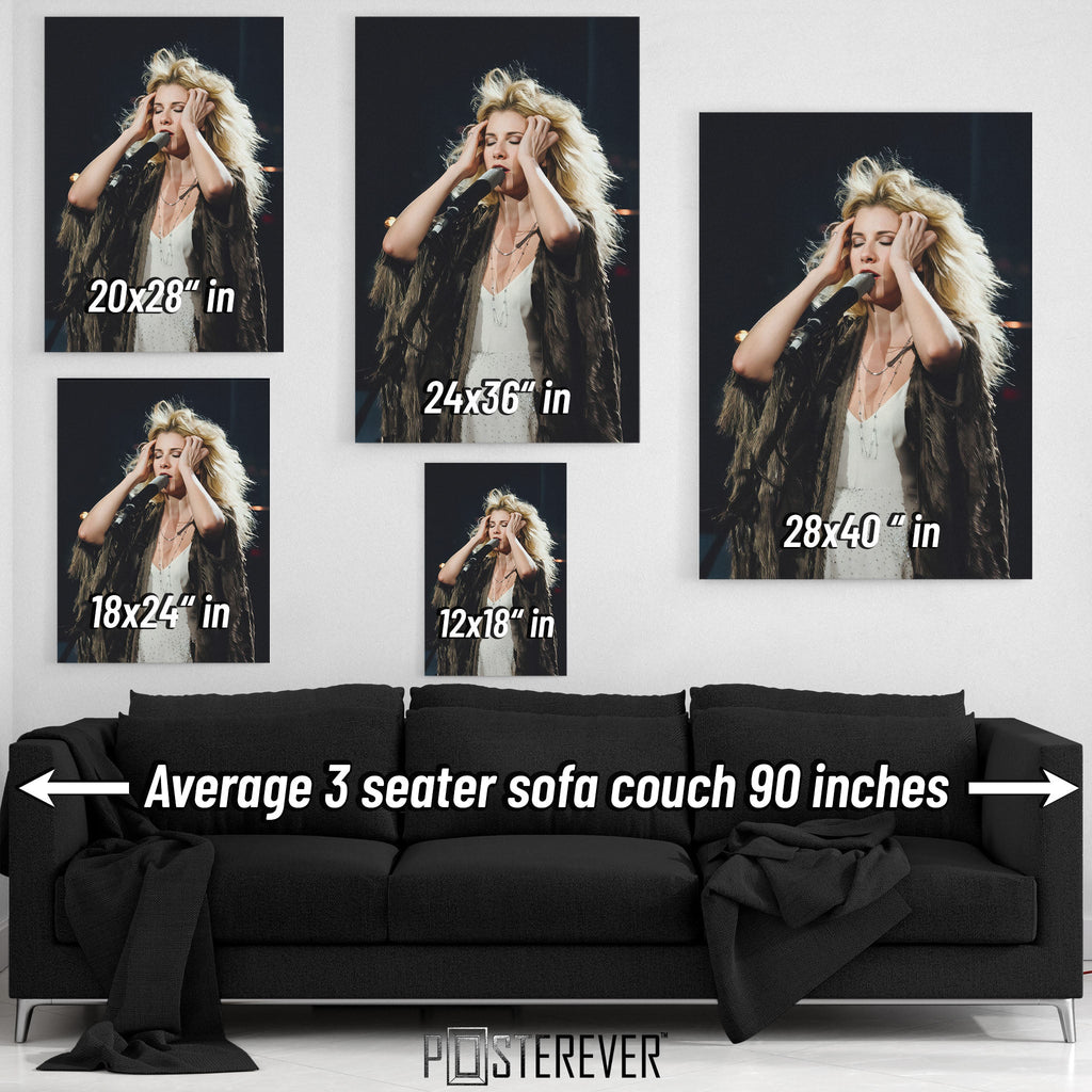 Wall art size comparison chart displaying multiple print dimensions above an average 3-seater sofa