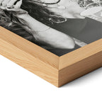 Corner close-up of the Stevie Nicks 1979 Tusk Tour black and white poster in a natural oak frame