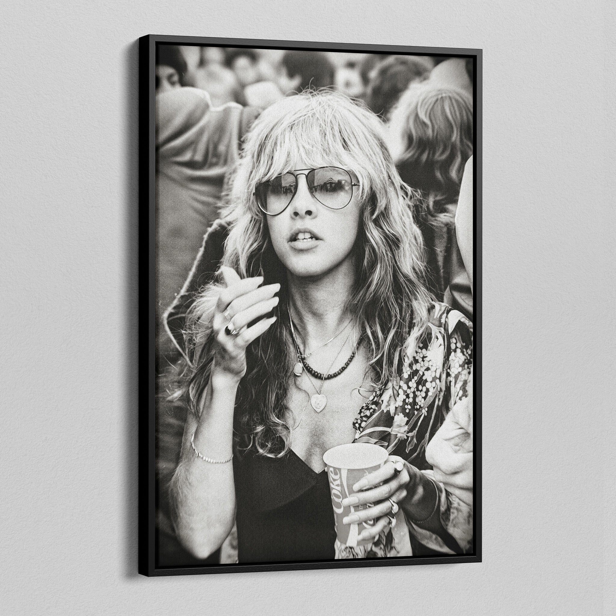 Angled view of the Stevie Nicks 1979 Tusk Tour black and white canvas in a black floating frame