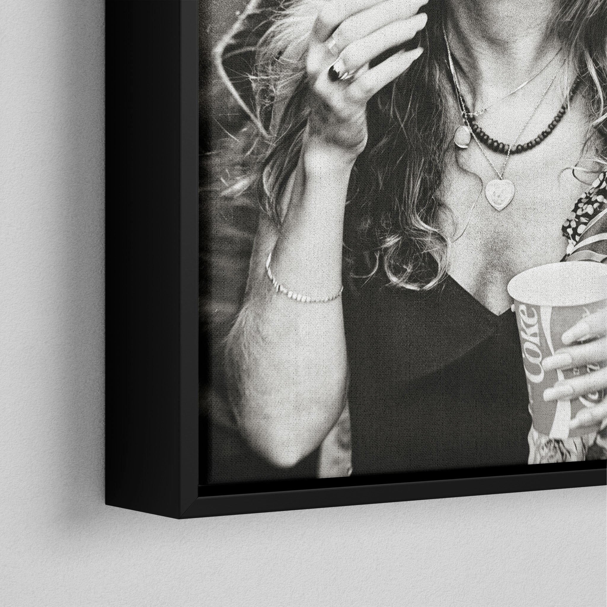Corner close-up of the black floating frame on the Stevie Nicks 1979 Tusk Tour black and white canvas